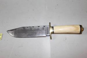 lot 22 image: Peterson Damascus steel polished bone handle Bowie-style knife