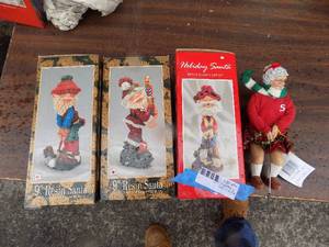 lot 74 image: Santa and Mrs. Clause Golfing