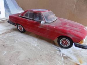 lot 65 image: James Bean Collector  Bottle - 1974 Mercedez Benz 450SL Porcelain Decanter  (needs tire reattached)