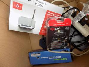 lot 78 image: Router, Hole punch,  electric strips
