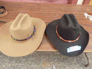 lot 23 image: Western hats-Tan Bailey Stampede size 6 34 and Black Eddy Rodeo Jr. size 6 34 both with bands