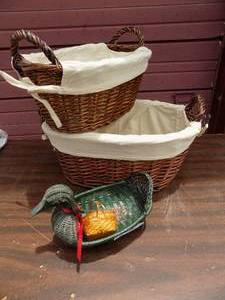 lot 103 image: 2 wicker baskets with liners and wicker duck