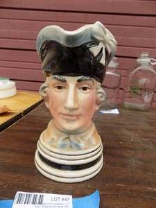 lot 47 image: Toby Mug Capitaine Richard Hennessey music box