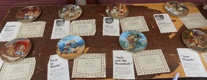 lot 125 image: Knowles Classic Fairy Tales plate collection 1992 S&N 3493 A x 8 plus plate rack sheet