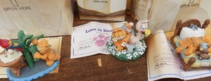 lot 133 image: Danbury mint- Garfield  love in bloom, king of the jungle, cat nap