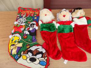 lot 146 image: Stockings-- santa, puppy, Ms. clause, and loony tunes