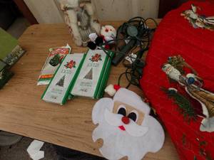 lot 156 image: Tree skirts, santa, electric cords NEW Icicles