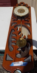 lot 210 image: Wall clock with pendulum 36x10