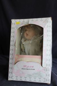 lot 68 image: Porcelain baby doll from the Rose Collection in original box.