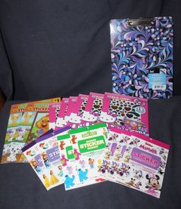 lot 92 image: Bulk lot of character themed items, including Hello Kitty sticker books, Minnie Mouse activity pads and more