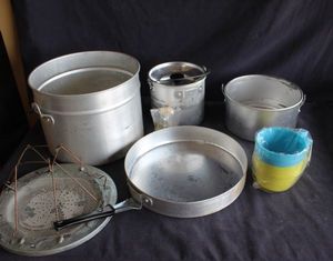 lot 150 image: Camping cookware and measuring cups