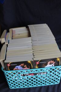 lot 164 image: Large Selection of Romance Books (basket not included)