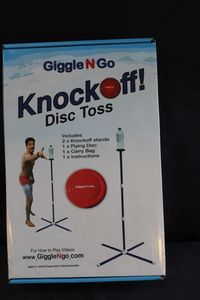 lot 183 image: Giggle n go knock off disc toss