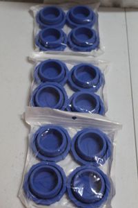 lot 285 image: Twelve lids for 5 gallon water bottles