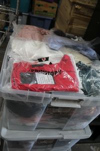 lot 242 image: Tote of Womens Blouses in a variety of sizes and styles, New Merchandise