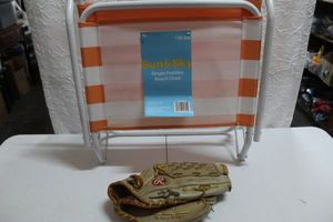 lot 237 image: Unused Folding Beach Chair and Baseball Glove