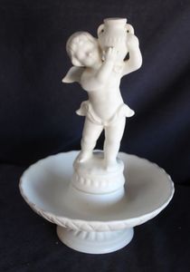 lot 23 image: Porcelain Cherub
