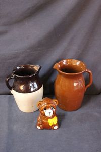 lot 363 image: Brown pottery items and honey bear