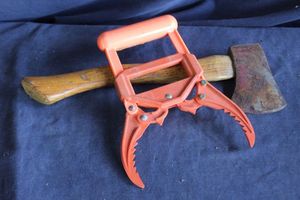 lot 219 image: Hatchet and Wood Tool