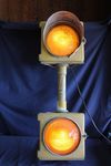 Stacked Two 12" Yellow Signal Light Heads with Glass Lenses.&nbsp; Lights Powered on at Time of Photos.