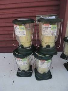 lot 172 image: Coleman citronella candle lanterns 70 hour x 4