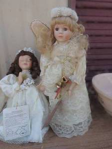 lot 260 image: Animated doll and angel doll