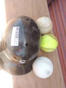 lot 344 image: Red socks helmet and softballs