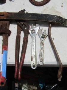 lot 99 image: Tools- channel locks pipe wrench, cresant wrench, plus