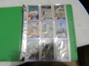 lot 122 image: Nolan Ryan cards in binder
