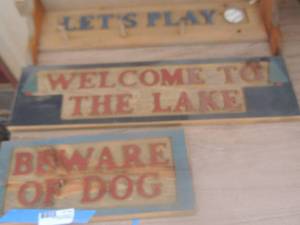 lot 22 image: Assorted wooden signs