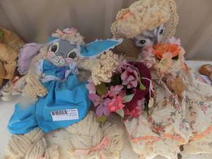 lot 496 image: Rabbit and cat dolls