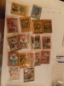 lot 531 image: Football cards-  Deion sanders, Archie Wade, Barry Sanders, Rodney Peete, Payton, Elway, sharp 16 cards