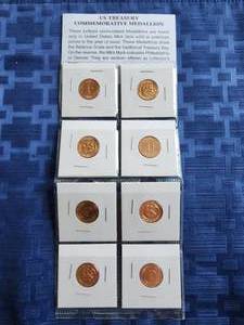 lot 33 image: US Treasury commemorative medallion set