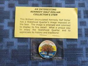 lot 45 image: Interesting Kennedy Half-dollar collectors item - Connecticut state quarter image imposed on the face