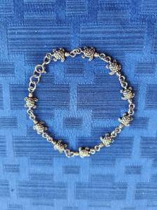 lot 18 image: Turtle bracelet marked .925 silver