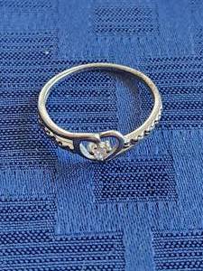 lot 22 image: Heart themed ring - marked 925 silver