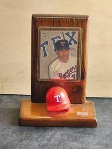 lot 64 image: Texas Rangers - Nolan Ryan baseball card in wood display