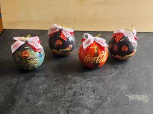lot 72 image: Selection of vintage collectible glass Coca Cola Christmas ornaments