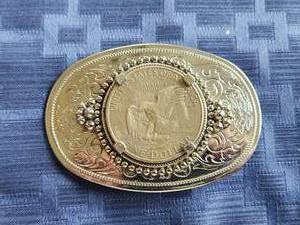 lot 66 image: Western Belt buckle with Eisenhower dollar coin