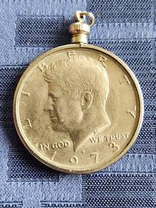 lot 74 image: 1973 Kennedy half dollar pendant