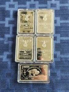 lot 34 image: Selection of 5 1-ounce bars of German silver 999 - is an alloy made mostly of copper, nickel, and zinc