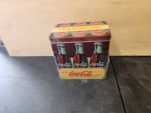 lot 106 image: Unopened Coca Cola metal tin