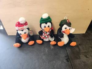 lot 114 image: Selection of 3 Coca Cola penguins