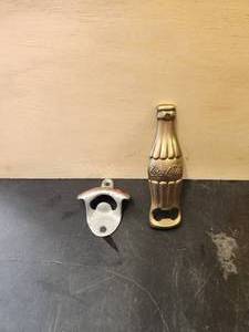 lot 116 image: Coca Cola bottle opener lot