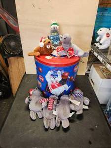 lot 169 image: Selection of Coca Cola plush toys and a large Coke metal tin