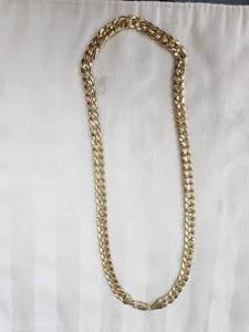 lot 180 image: Looks to be a gold chain - marked 18k - 72g