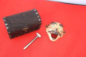 lot 33 image: 4 Eyed Man Cast Bottle Opener and Chest