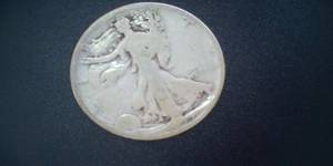 lot 102 image: 1927 Silver Walking Liberty Half Dollar