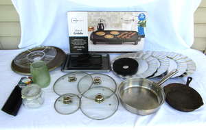 lot 506 image: Mainstays 20 cooking griddle, plus assorted serving and cookware