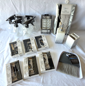 lot 521 image: Better Homes & Gardens shower hooks, Mainstays shower curtain, Betydlig curtain rod holders, and more